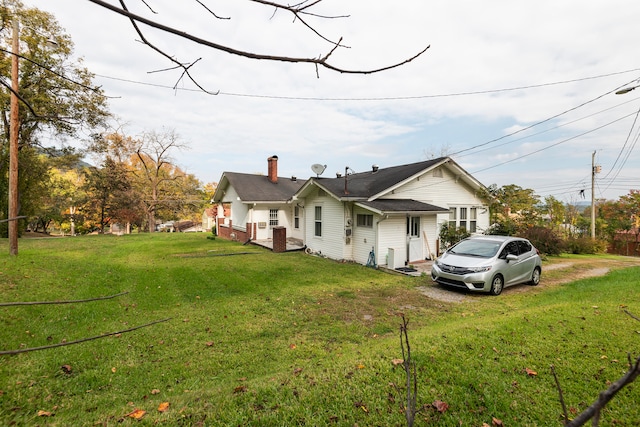 exterior space featuring a front yard