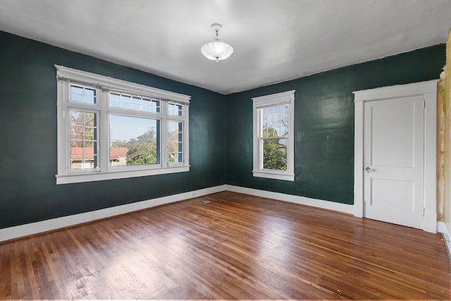 empty room featuring hardwood / wood-style floors