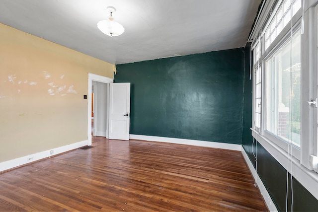 empty room featuring dark hardwood / wood-style floors