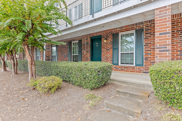 doorway to property with a balcony