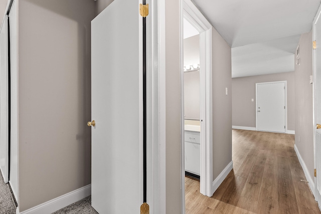 corridor featuring light hardwood / wood-style flooring