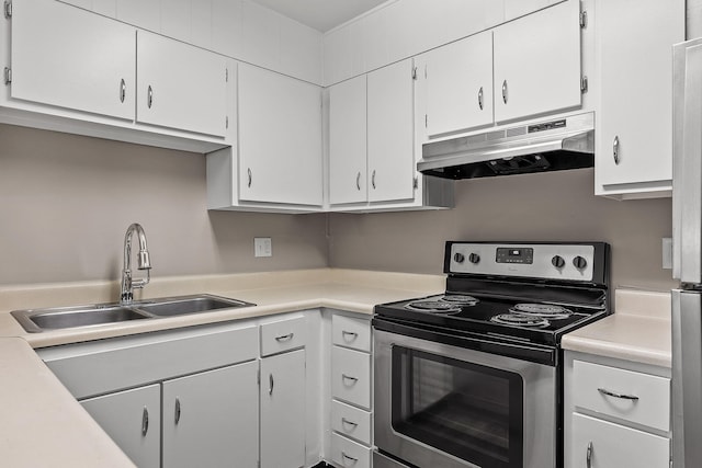 kitchen with sink, white cabinets, and stainless steel electric stove