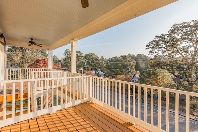 wooden terrace with ceiling fan