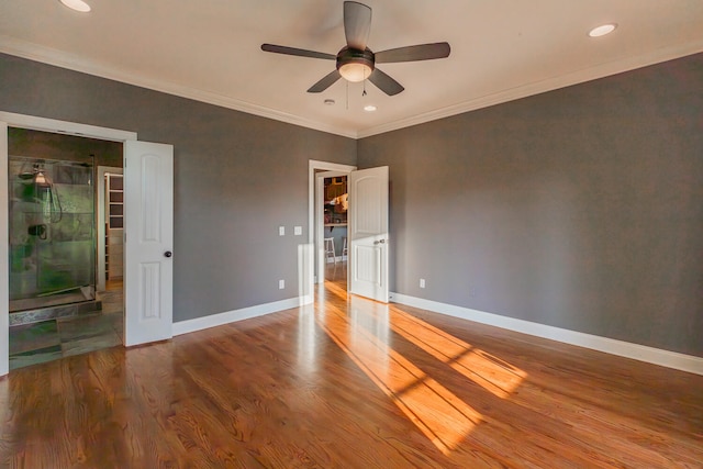 unfurnished bedroom featuring ornamental molding, hardwood / wood-style flooring, and ceiling fan