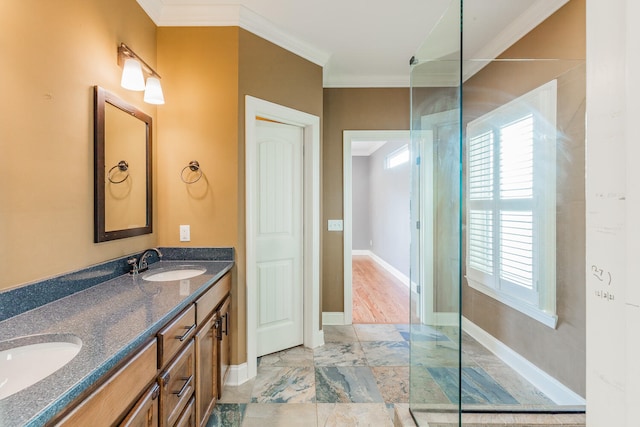 bathroom featuring vanity, crown molding, and a shower