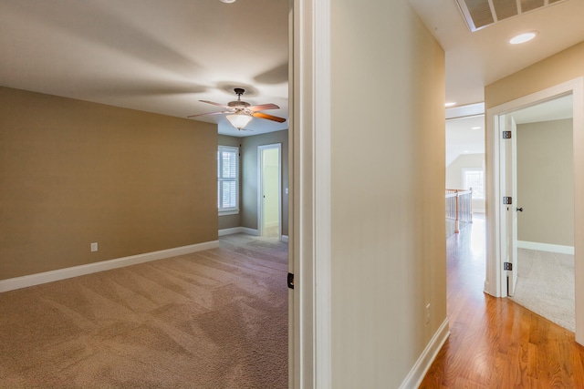 hall featuring light wood-type flooring