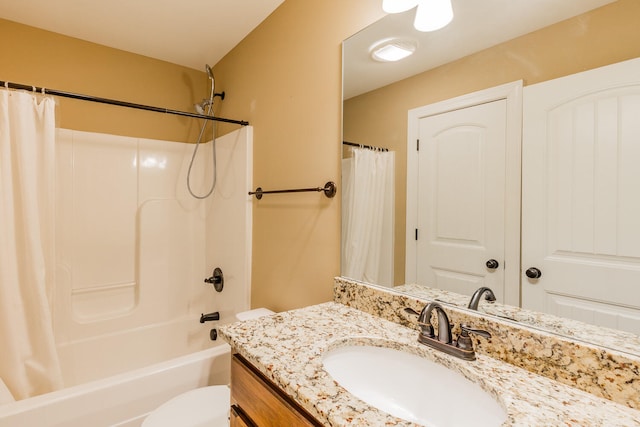 full bathroom featuring vanity, toilet, and shower / bath combo with shower curtain