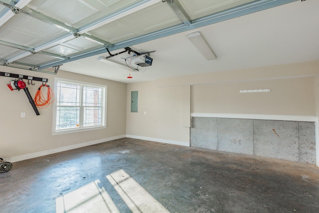 garage featuring a garage door opener and electric panel