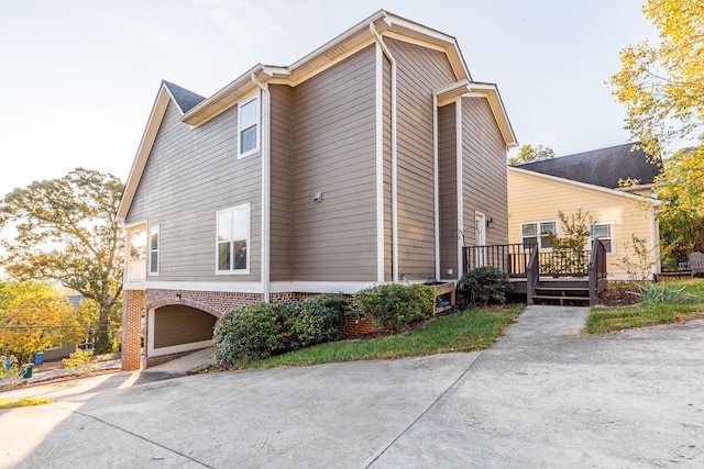 view of property exterior featuring a garage