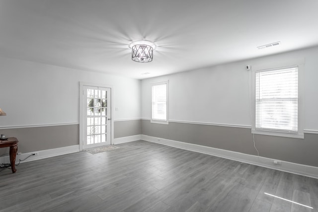 empty room featuring hardwood / wood-style floors