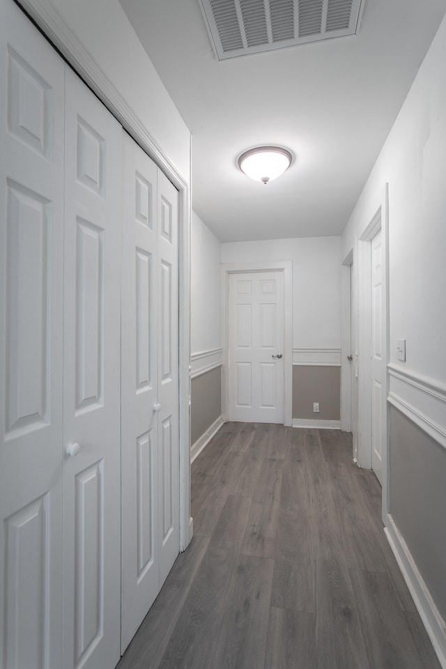 hallway featuring dark hardwood / wood-style floors