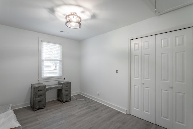 home office with light wood-type flooring