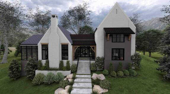 view of front of home with a sunroom and a front yard