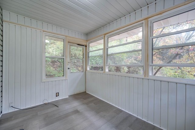 unfurnished sunroom featuring a healthy amount of sunlight