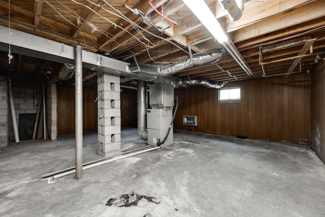 basement featuring heating unit