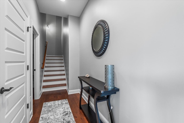 staircase featuring hardwood / wood-style floors