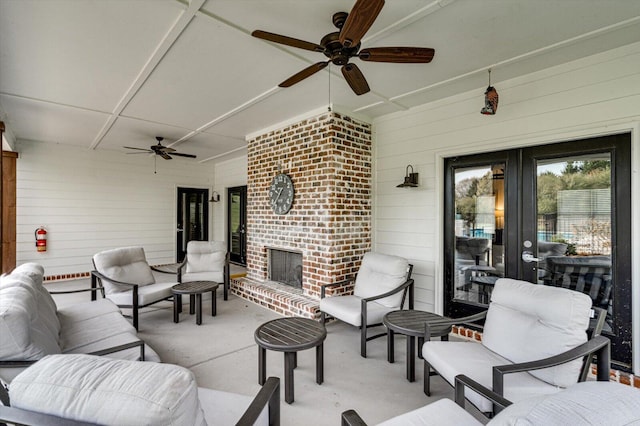 view of patio featuring an outdoor living space, french doors, and ceiling fan