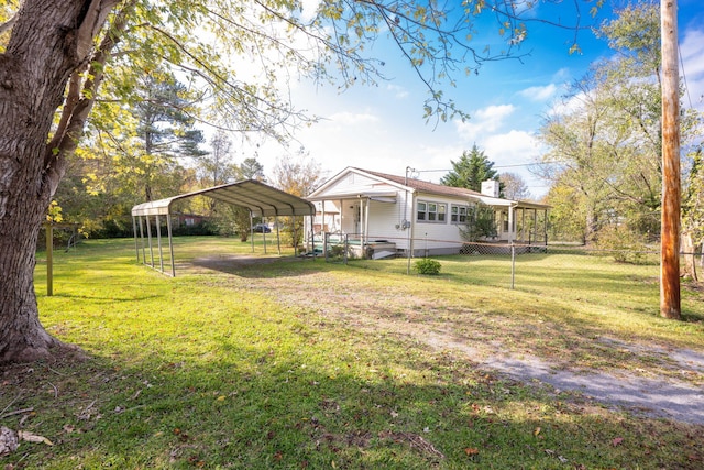 view of yard featuring a carport