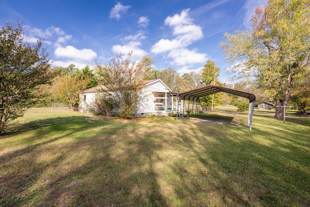 view of yard featuring a carport