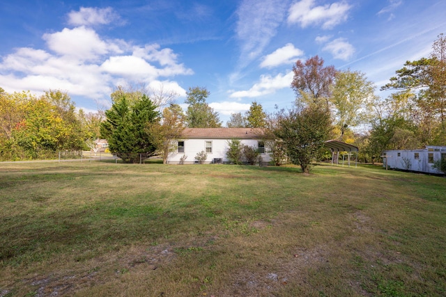 view of yard featuring a carport