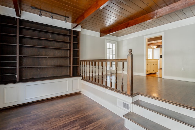 hallway with wood ceiling, dark hardwood / wood-style floors, and beam ceiling