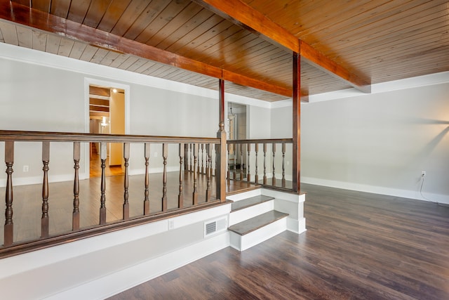 hallway with wood ceiling, hardwood / wood-style flooring, and beamed ceiling