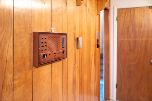 interior details featuring wooden walls