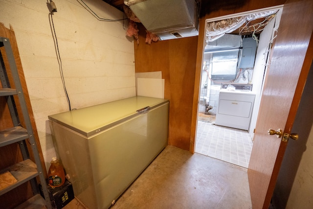 washroom featuring washer / clothes dryer and electric panel