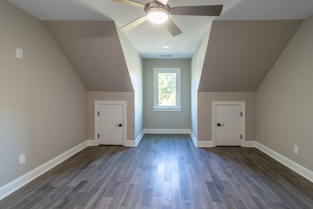 bonus room with ceiling fan, lofted ceiling, and dark hardwood / wood-style flooring