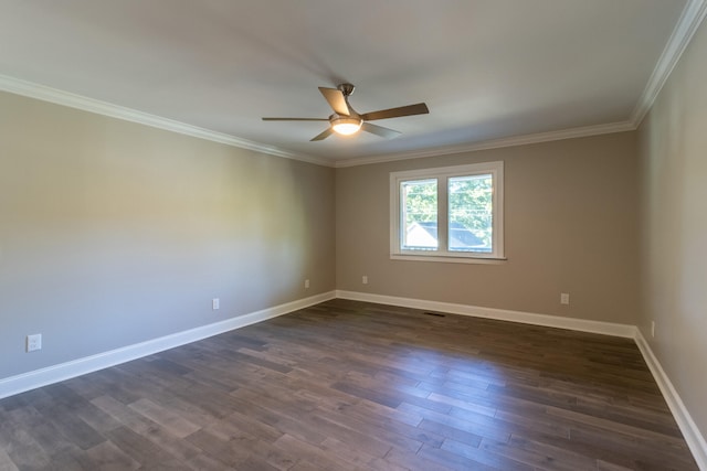 spare room with dark wood-type flooring, ceiling fan, and ornamental molding