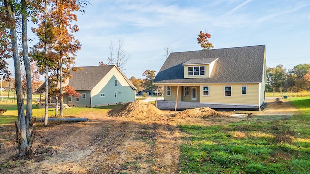 view of front of home with a front yard