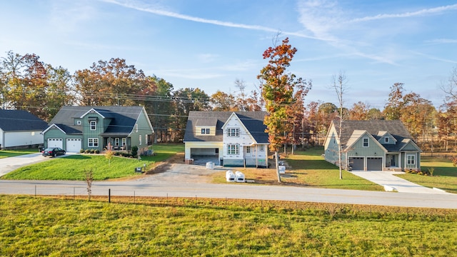 view of front facade featuring a garage and a front yard