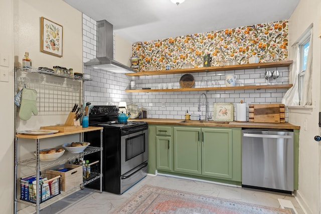 kitchen with decorative backsplash, wall chimney exhaust hood, sink, black / electric stove, and stainless steel dishwasher