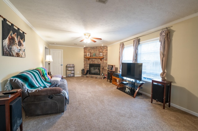 carpeted living room featuring a fireplace, a textured ceiling, crown molding, and ceiling fan