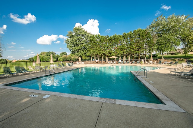 view of pool featuring a patio area