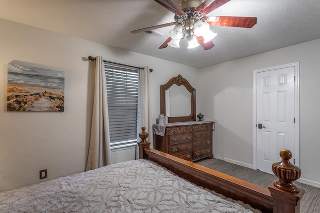 bedroom with hardwood / wood-style floors and ceiling fan