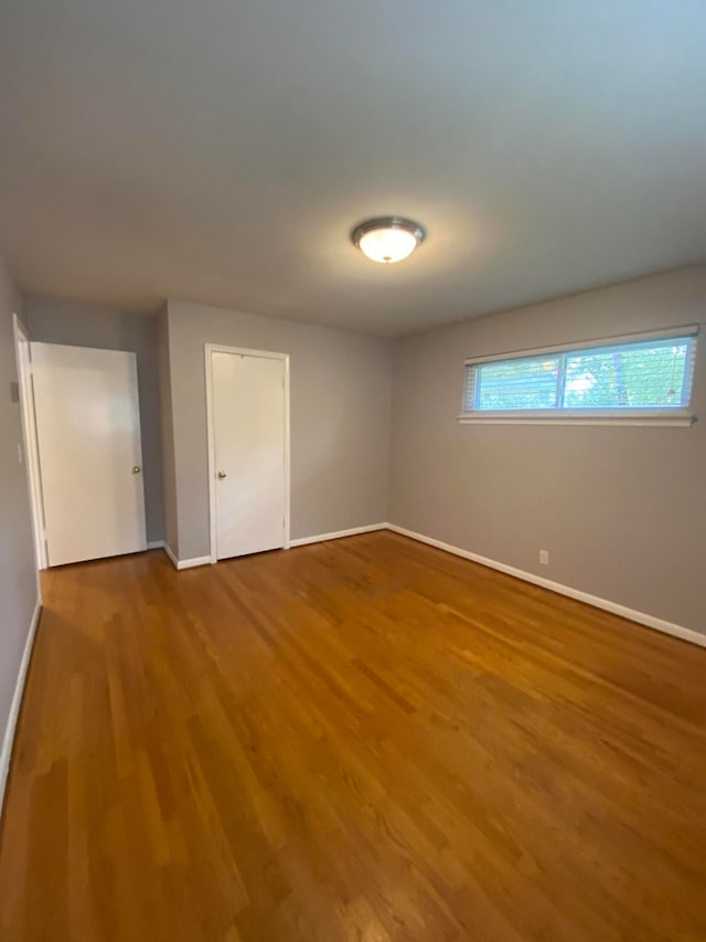 spare room featuring hardwood / wood-style flooring