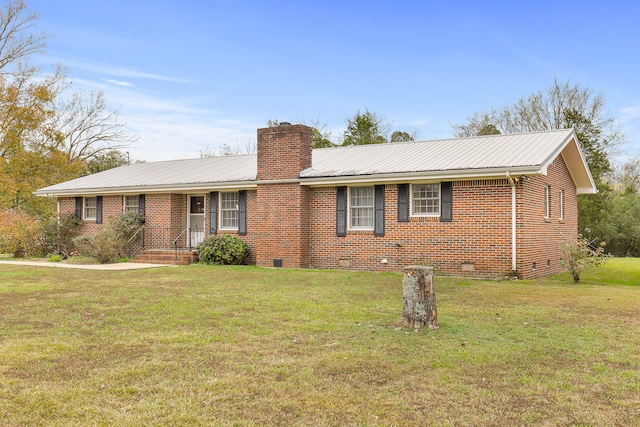 ranch-style home featuring a front lawn