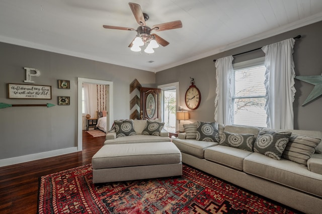 living room featuring crown molding, dark hardwood / wood-style floors, and ceiling fan