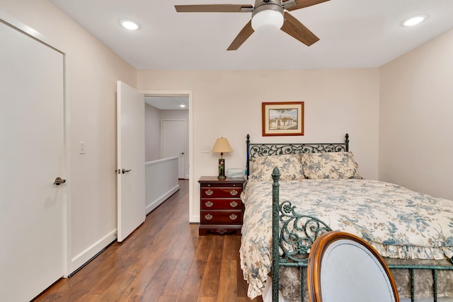 bedroom featuring dark wood-type flooring and ceiling fan