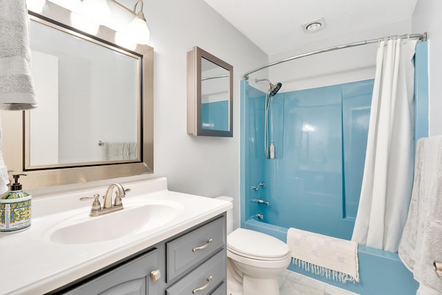 full bathroom featuring toilet, vanity, and shower / tub combo