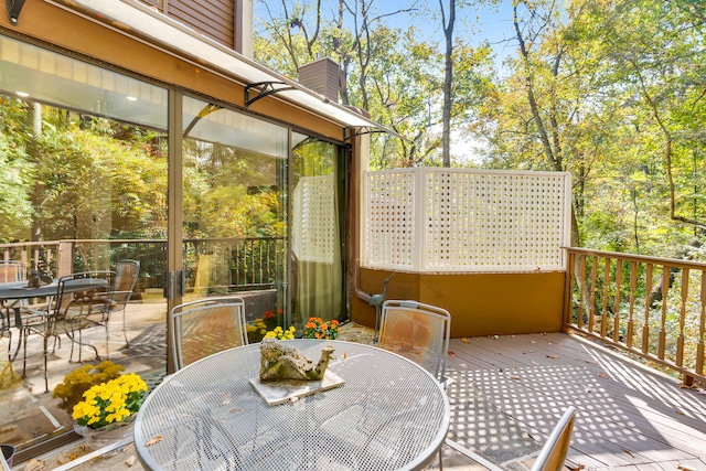 exterior space featuring a wooden deck