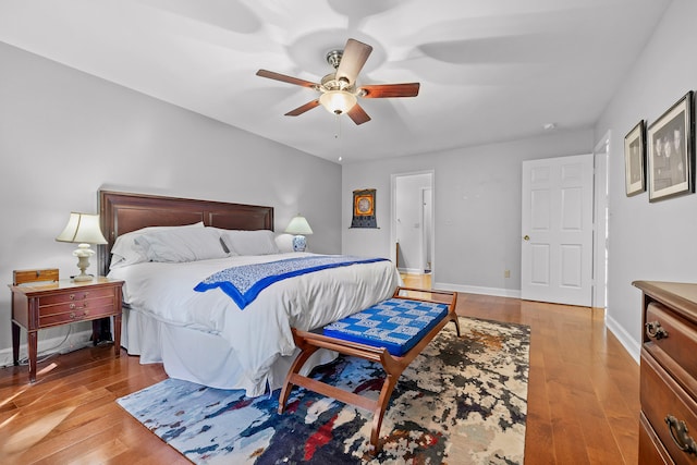 bedroom featuring light hardwood / wood-style floors and ceiling fan