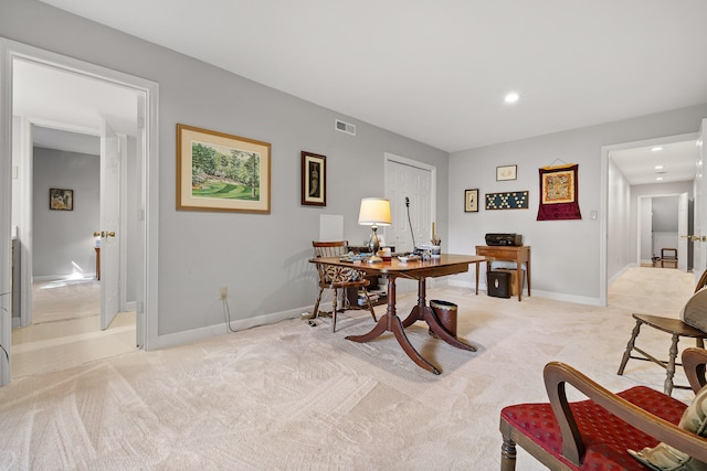 home office with light colored carpet