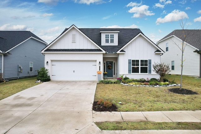 view of front facade featuring a garage and a front yard