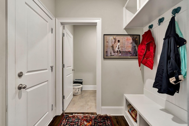 mudroom with light tile patterned floors