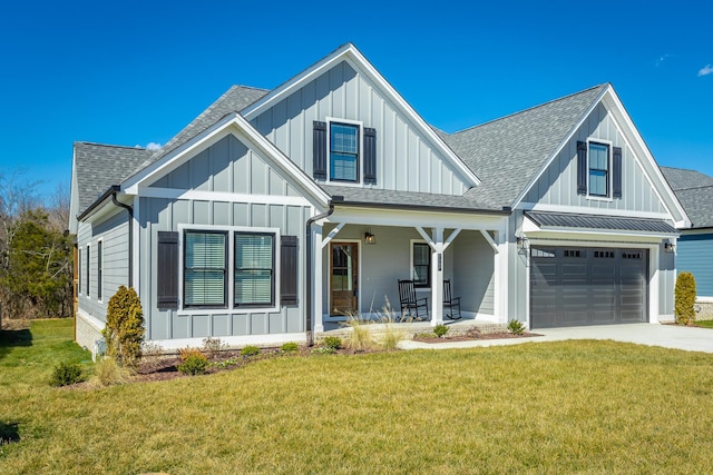 modern inspired farmhouse with roof with shingles, covered porch, concrete driveway, board and batten siding, and a garage