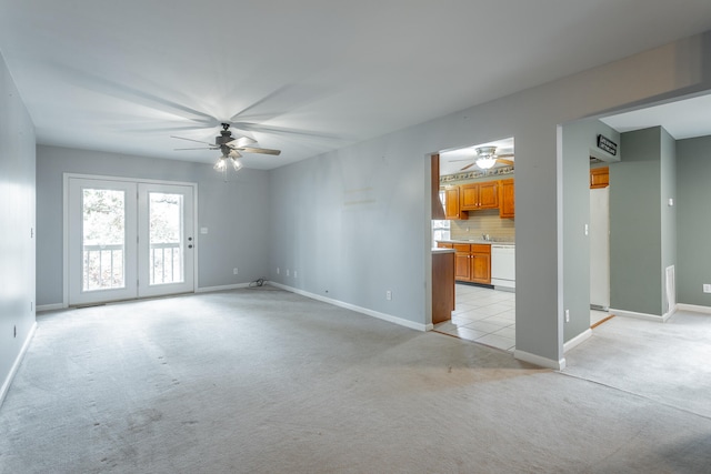 carpeted empty room with ceiling fan