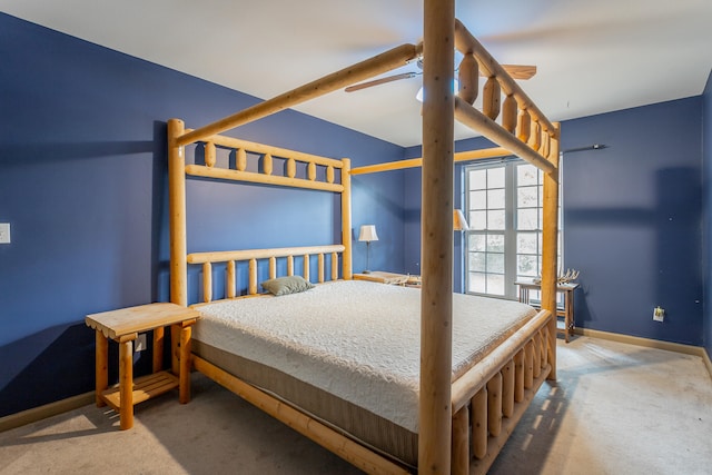 bedroom featuring ceiling fan and carpet floors