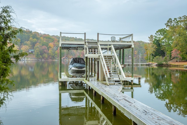 view of dock with a water view